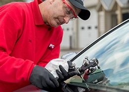 Auto glass being replaced.