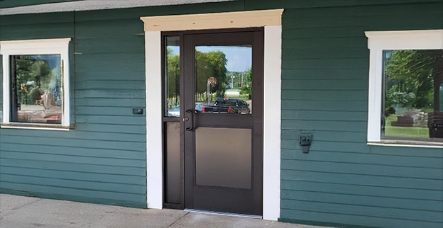 A picture of a newly installed glass storefront.