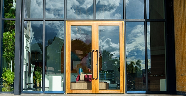 A picture of a commercial storefront with safety glass doors and windows installed.