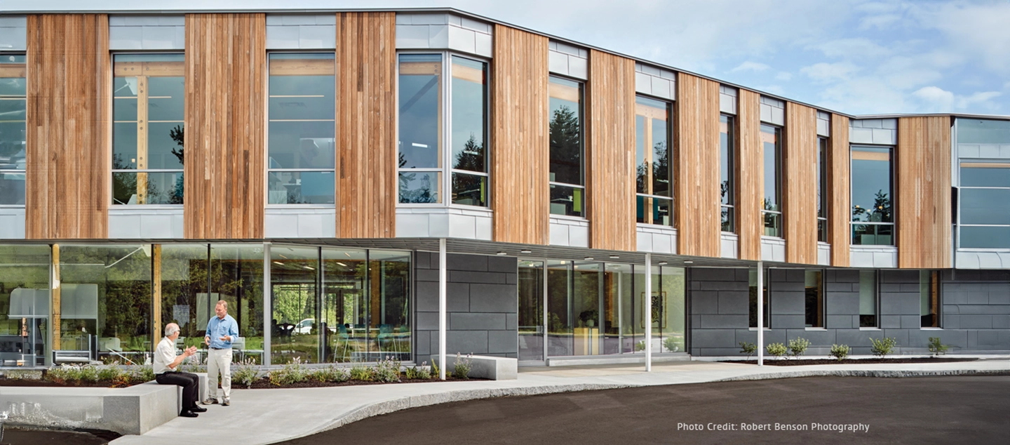 A picture of a commercial business with newly installed glass doors and windows.