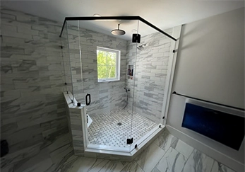 Neo-Angle Glass Shower Enclosure with Black Hardware.