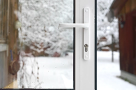 A picture of a glass exterior doorway.
